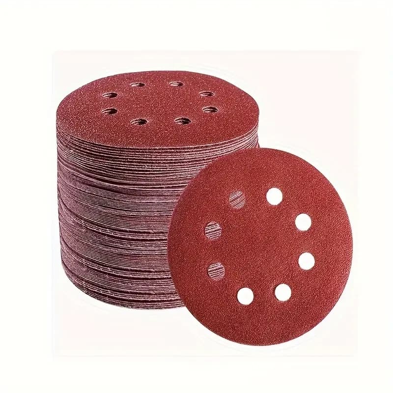A pack of 50 five-inch (125mm) sanding discs with eight holes, ranging from grit 60 to 1000, hook and loop.