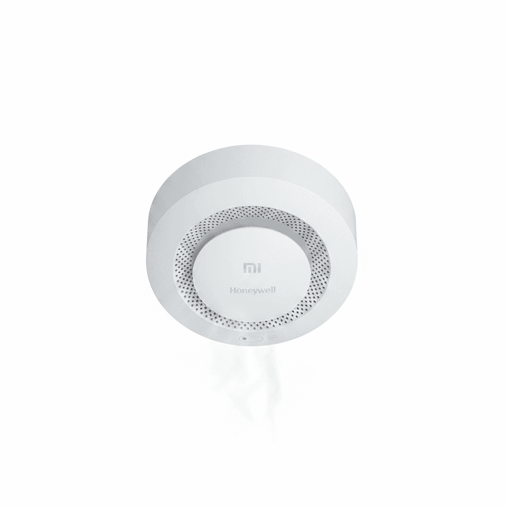Xiaomi Smoke Detector, a white circular device with a central button.