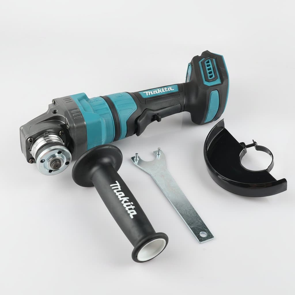 Makita Ga050g brushless angle grinder with lithium-ion battery, showing the high-power tool held in a gloved hand on a workbench.