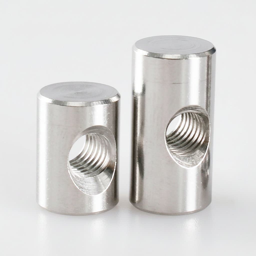 304 stainless steel cross hole barrel nut with cylindrical pin, sizes M4 to M6, for dowel-style embedding and locking in wood furniture.
