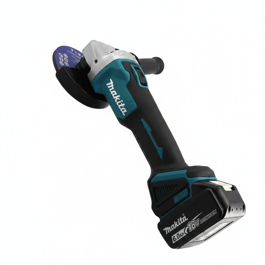 Makita DGA404 18V cordless angle grinder with 125mm disc, brushless motor, and 6.0Ah battery, shown on a workbench.