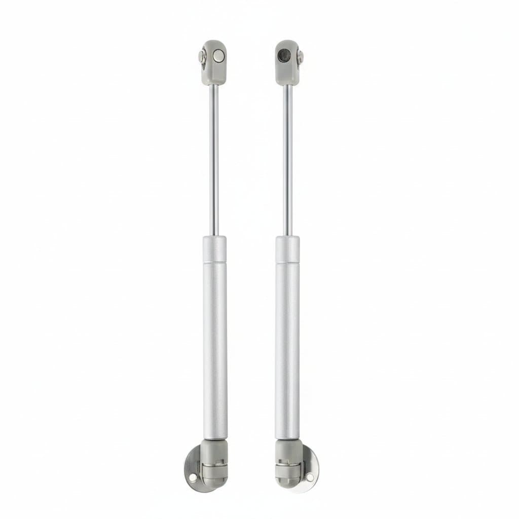 Set of two pneumatic support gas springs with multiple force options (20-150N) for kitchen cabinet doors and furniture lifting applications.