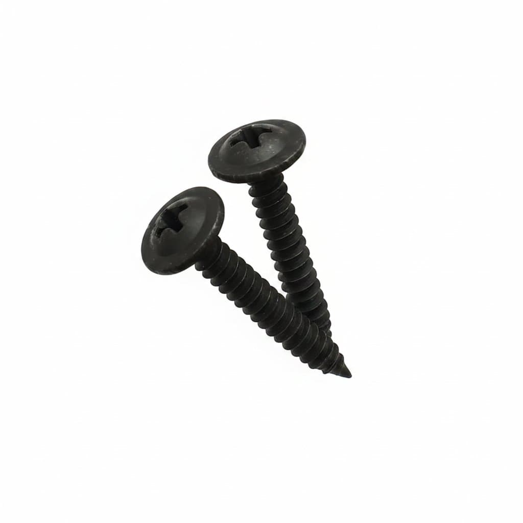 Tapping screws held in hand, many more blurred in background.