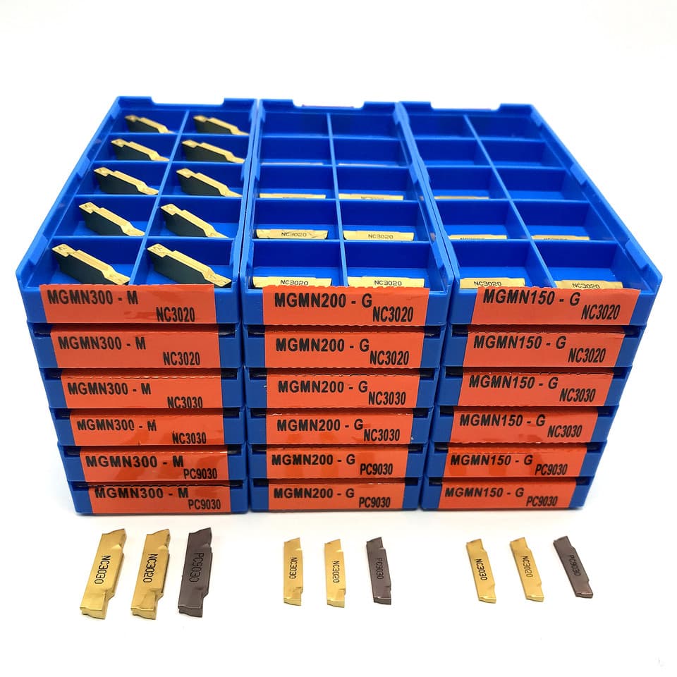 A selection of MGMN carbide insert blades for slotted cutting, suitable for lathe tools and CNC machining.