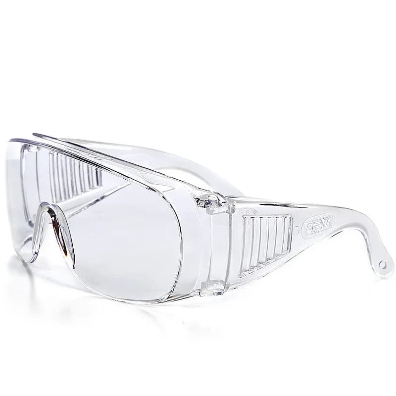 Clear vented safety goggles with anti-fog coating, designed for eye protection in work and outdoor settings.